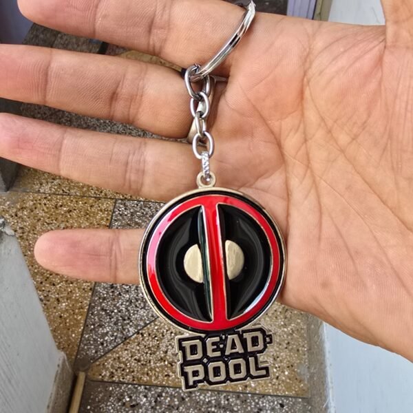 Deadpool Metal Keychain, Marvel Deadpool Keychain, Deadpool Logo Keychain, Metal Superhero Keychain, Red White Black Deadpool Keychain, Premium Deadpool Keychain, Marvel Collectible Keychain, Bike Keychain, Deadpool Mask Keychain, High Edition Paint Finish Keychain, Keychain.co.in, Marvel Fan Gift, Deadpool Merchandise, Comic Character Keychain, Metal Keychain for Bags and Keys